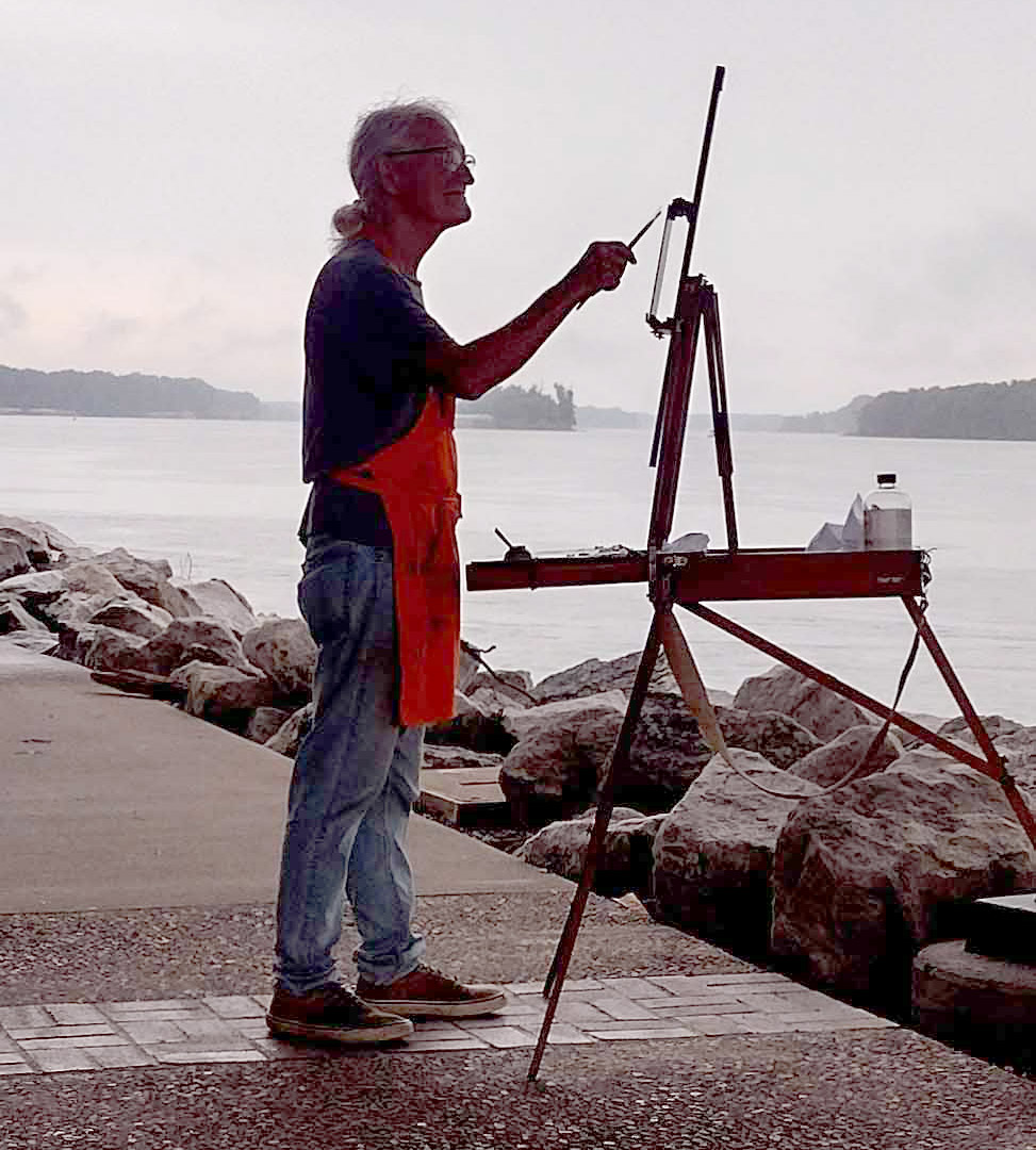 Art Artist painting at riverside