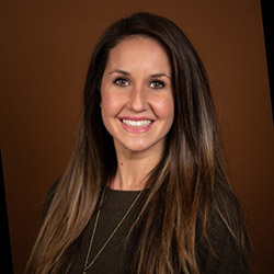 Smiling female with long brown hair 
