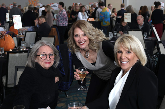 Smiling women at SCC Great Tastes Fundraiser