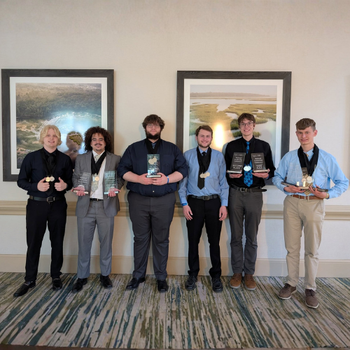 Computer Club students show off their awards